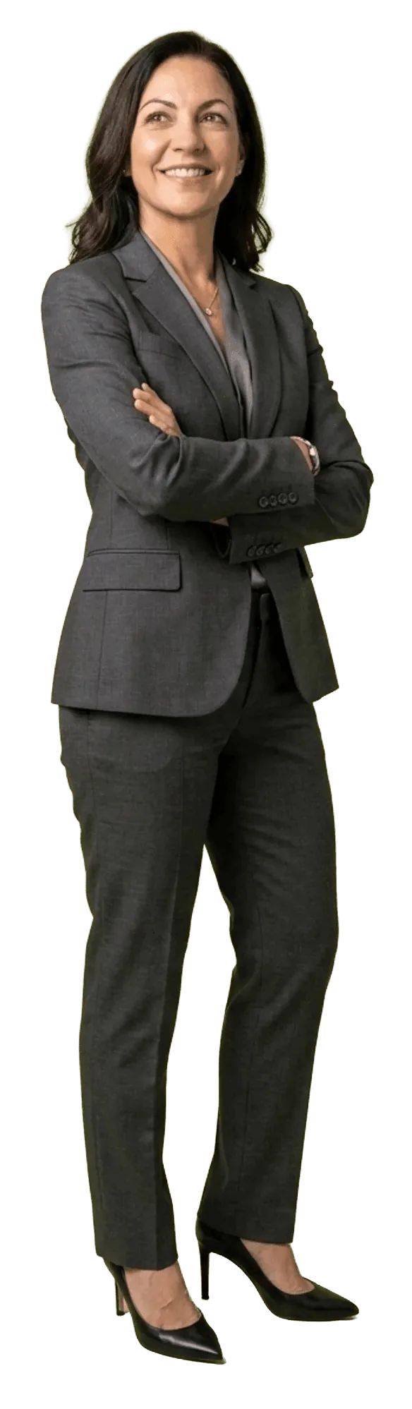 Female plastic surgeon standing confidently in a gray pinstripe suit, arms crossed, the surgeon her patient base is looking for